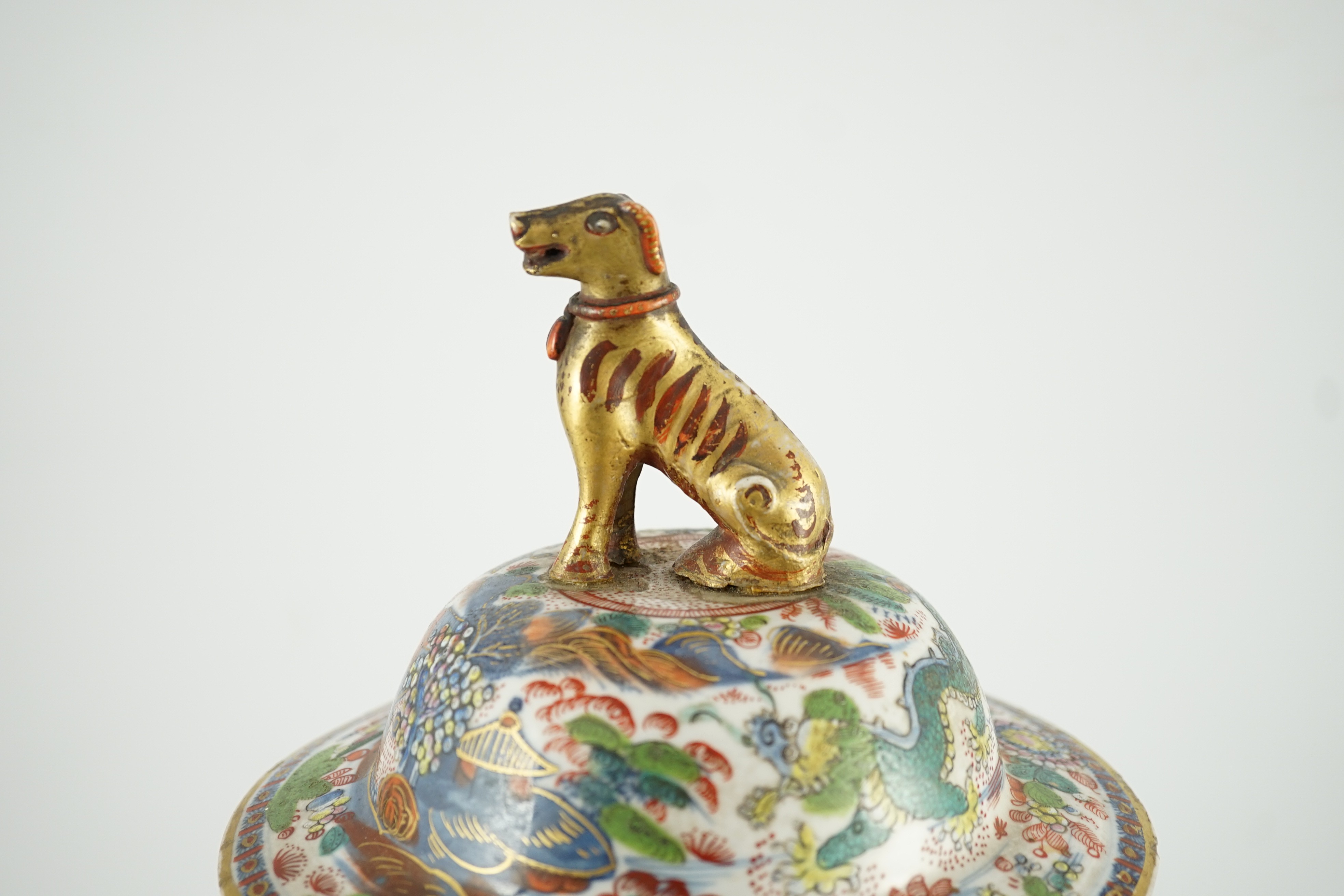 A Chinese clobbered blue and white vase and cover, 18th/19th century, 47cm high